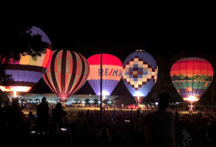 Colorful hot air balloons rising together